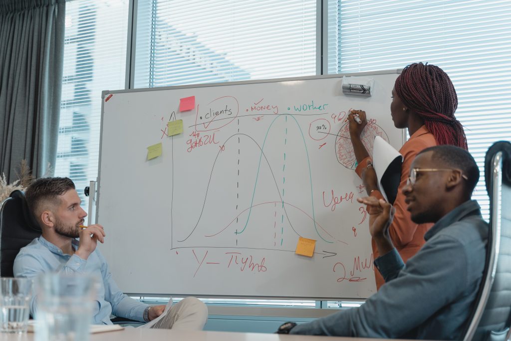 Founder discussing a software project roadmap with a product team
